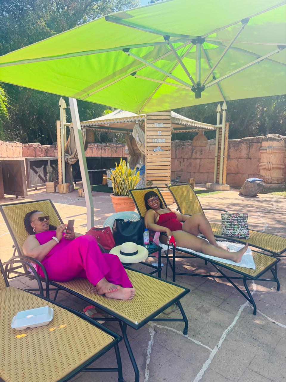 Guests relaxing poolside on a Host with the Utmost retreat